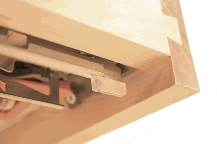 Lowered drawer front to conceal drawer slide